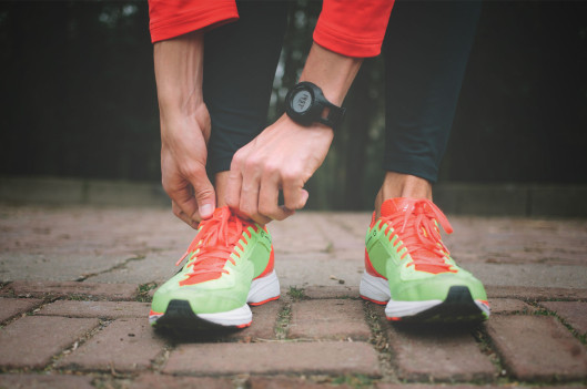 Man Tying Running Shoes | Exercising My Way to Better Parenting