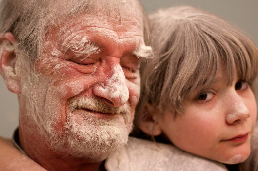 Girl and Grandfather Covered in Flour | My Father the Introvert: A Photo Essay