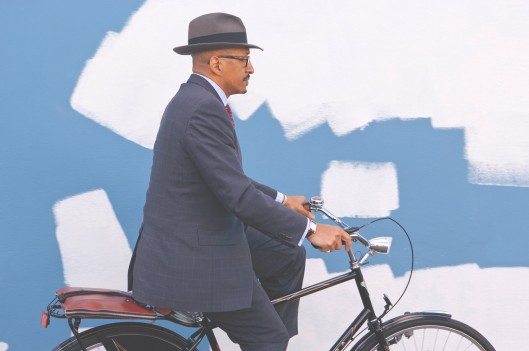Business man riding his bicycle to work