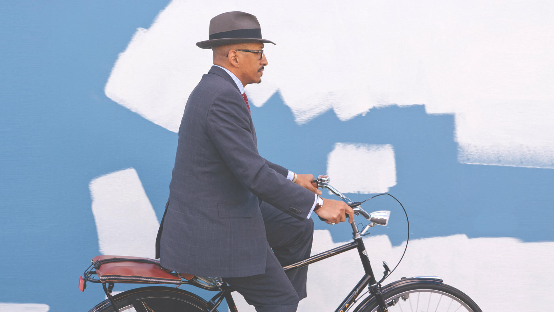 Business man riding his bicycle to work