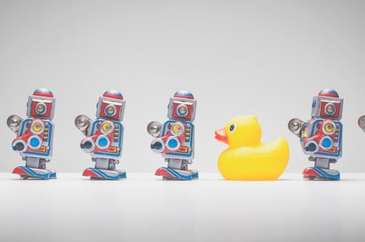 Rubber duck in line with robots